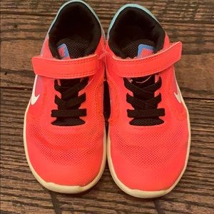 Girls Nike sneakers.